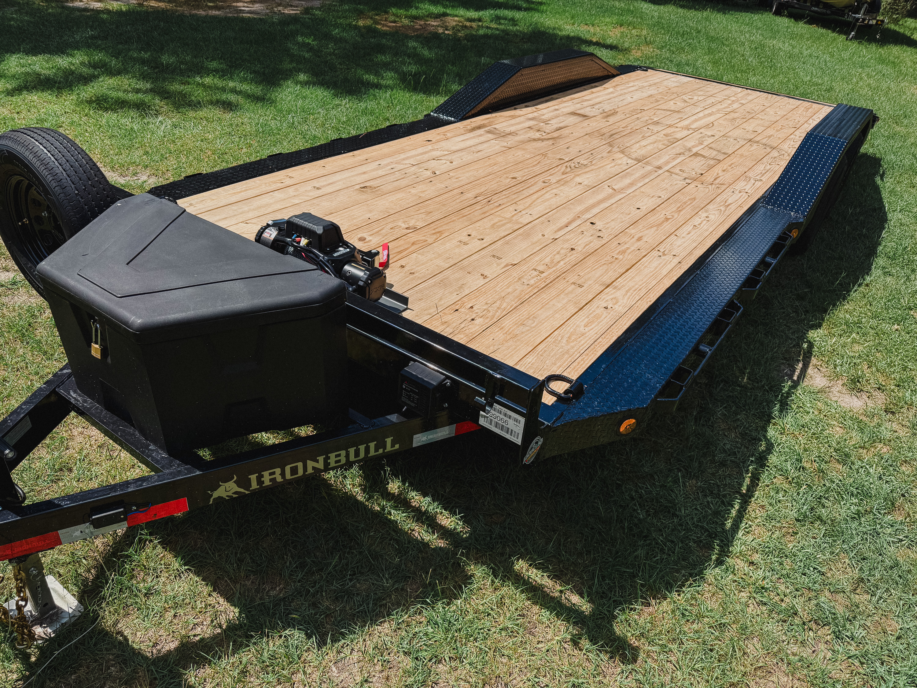 8.5x22 Iron Bull car hauler rental Aiken SC - Top-down view of wood deck